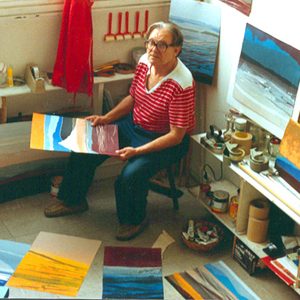 Arthur Secunda painting in his Paris Studio in 1991